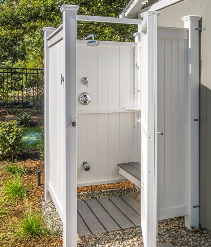 vinyl outdoor shower near pool house