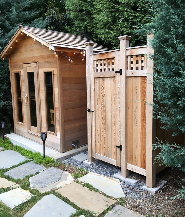 outdoor shower enclosure next to sauna