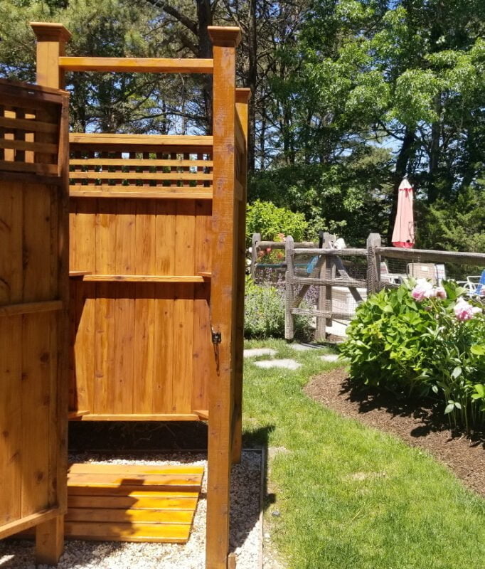 freestanding outdoor shower enclosure with tall posts