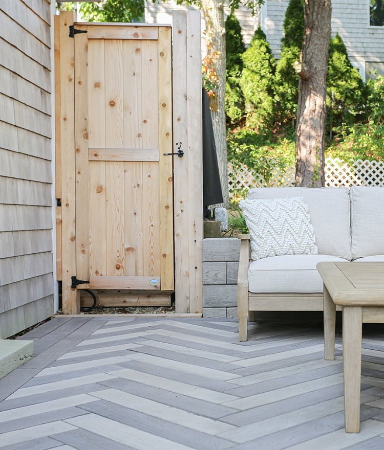custom cedar shower kit against house
