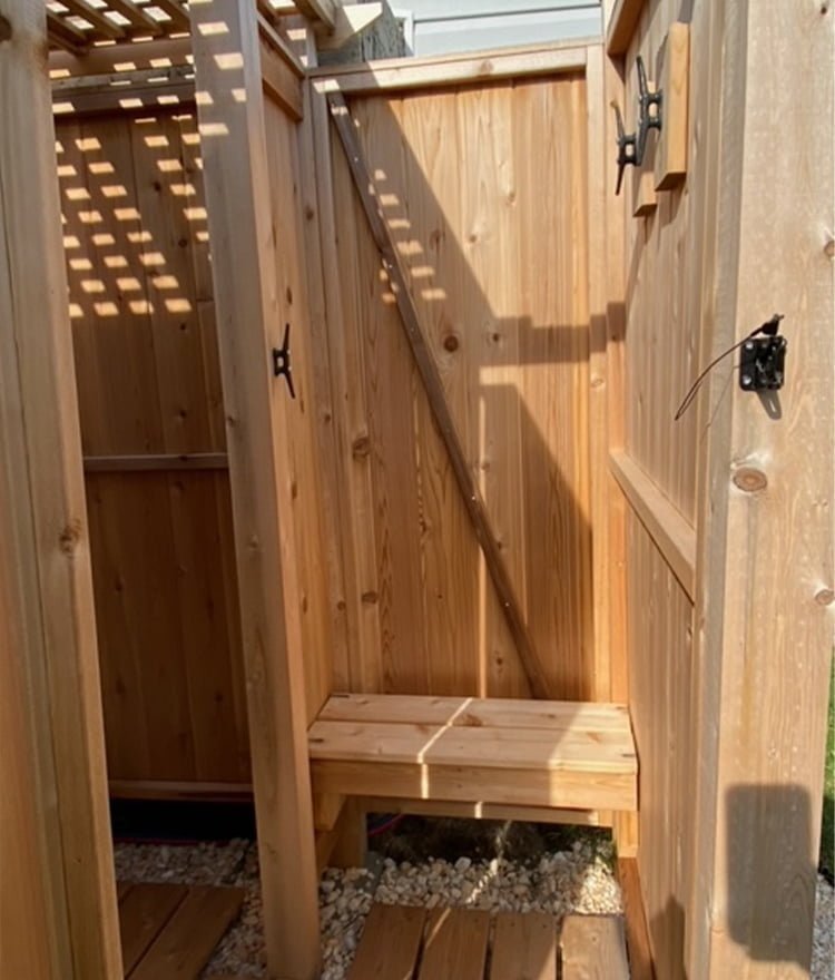 cedar outdoor shower with lattice roof