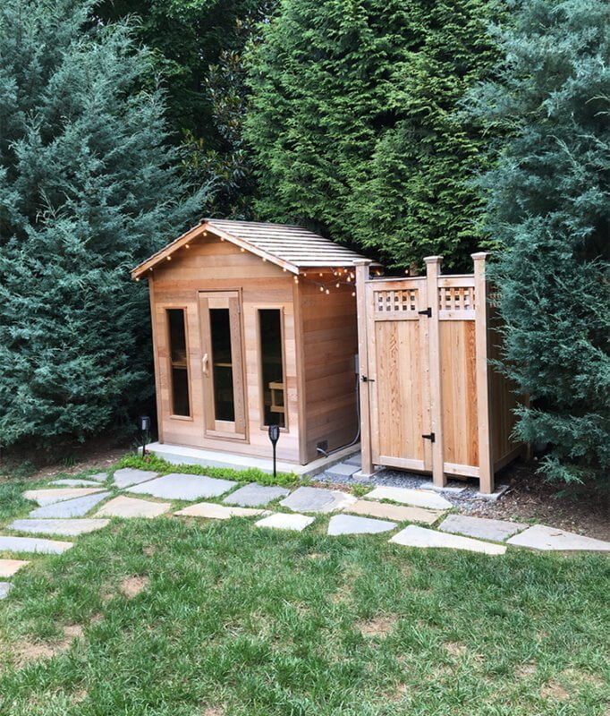 cedar freestanding outside shower with lattice