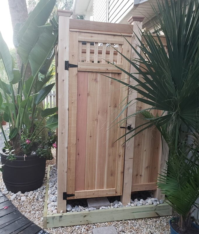 cedar outdoor shower with lattice panels in Florida