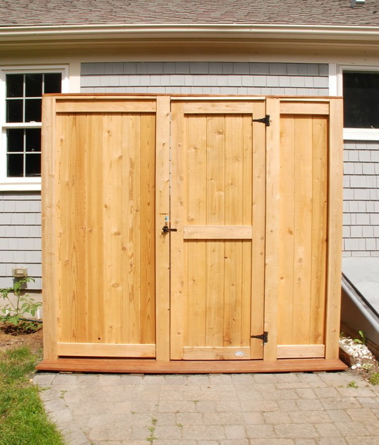 cedar deluxe outside shower against the house