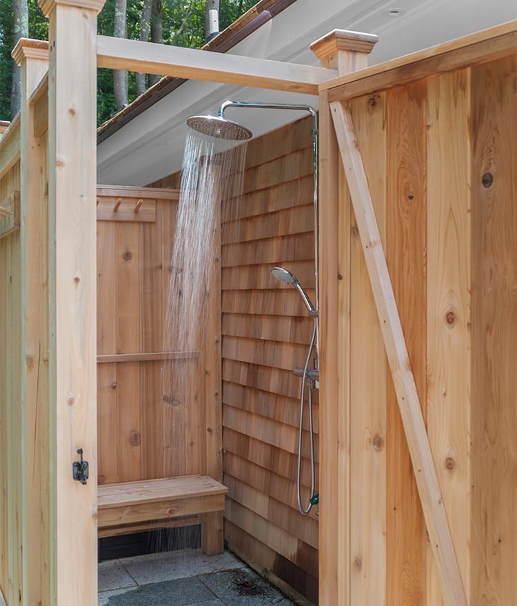 83 house mount shower in backyard