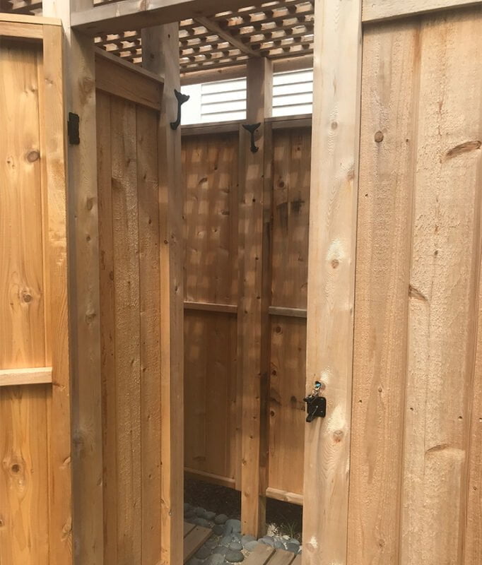 free standing outdoor shower kit with wood lattice panels