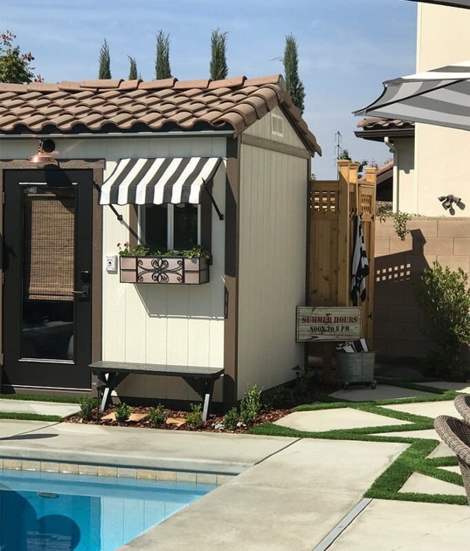 freestanding outdoor shower by the pool
