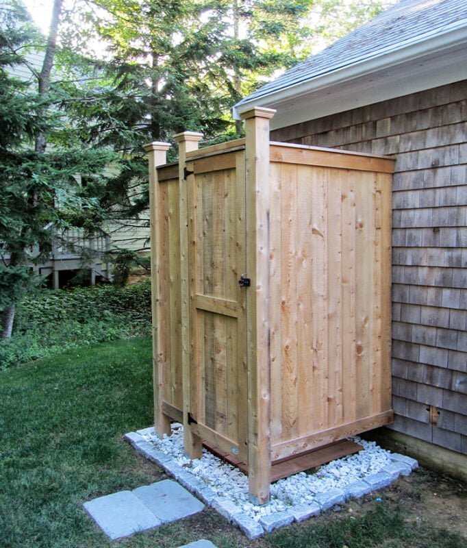 cedar shower enclosure kits against the house