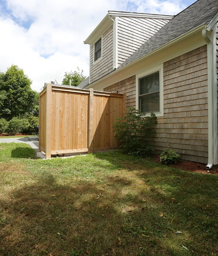 wood outdoor shower deluxe in the backyard