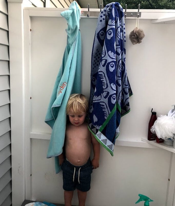 pvc pool shower against the house