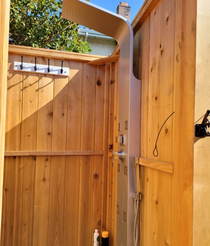freestanding outdoor shower with stainless steel fixture