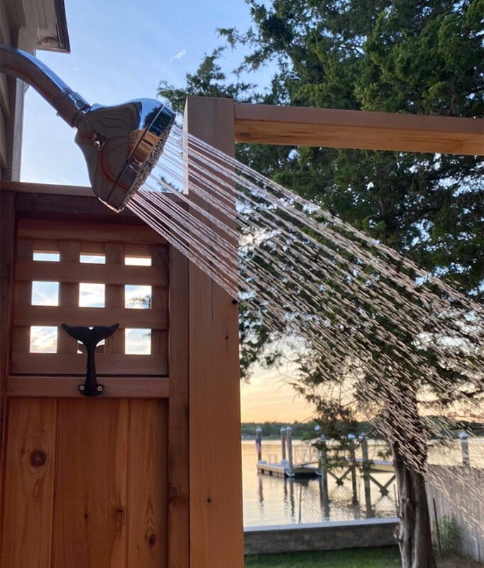 outdoor shower stall with lattice panels