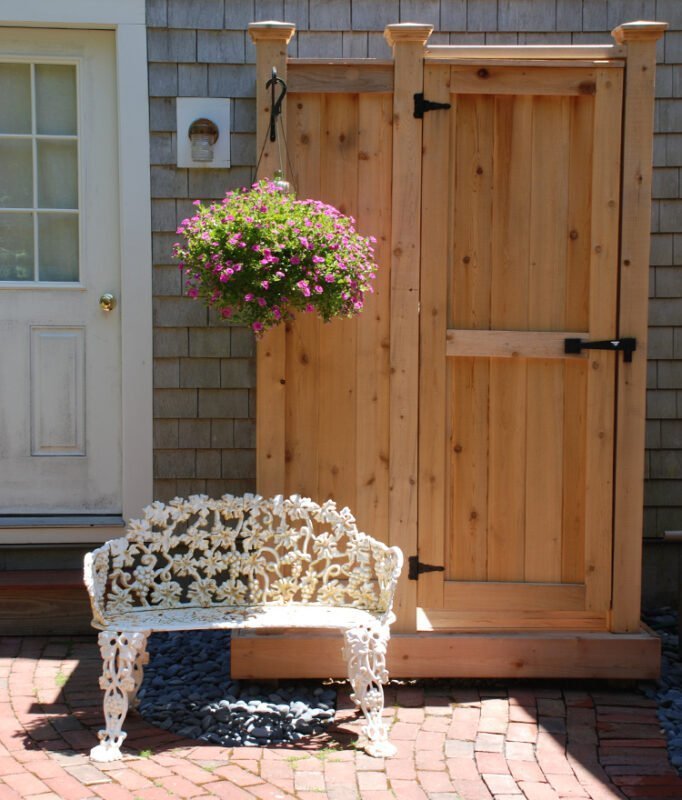 cedar outside shower against the house