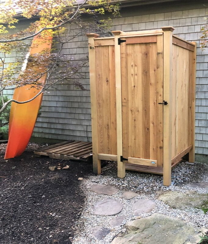 lake house outside shower against the house