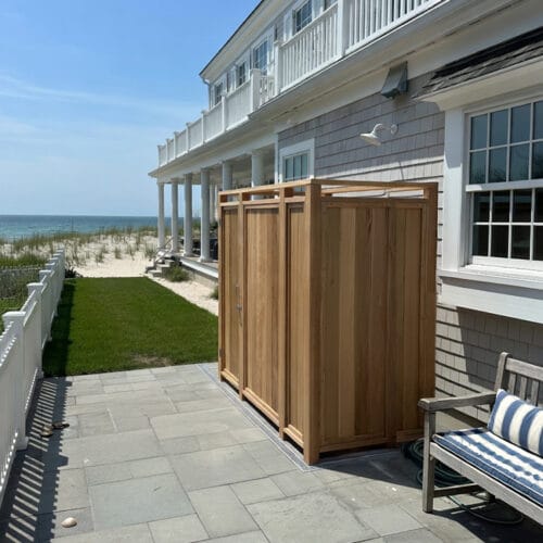 cedar shower enclosure shown at a NY hamptons home